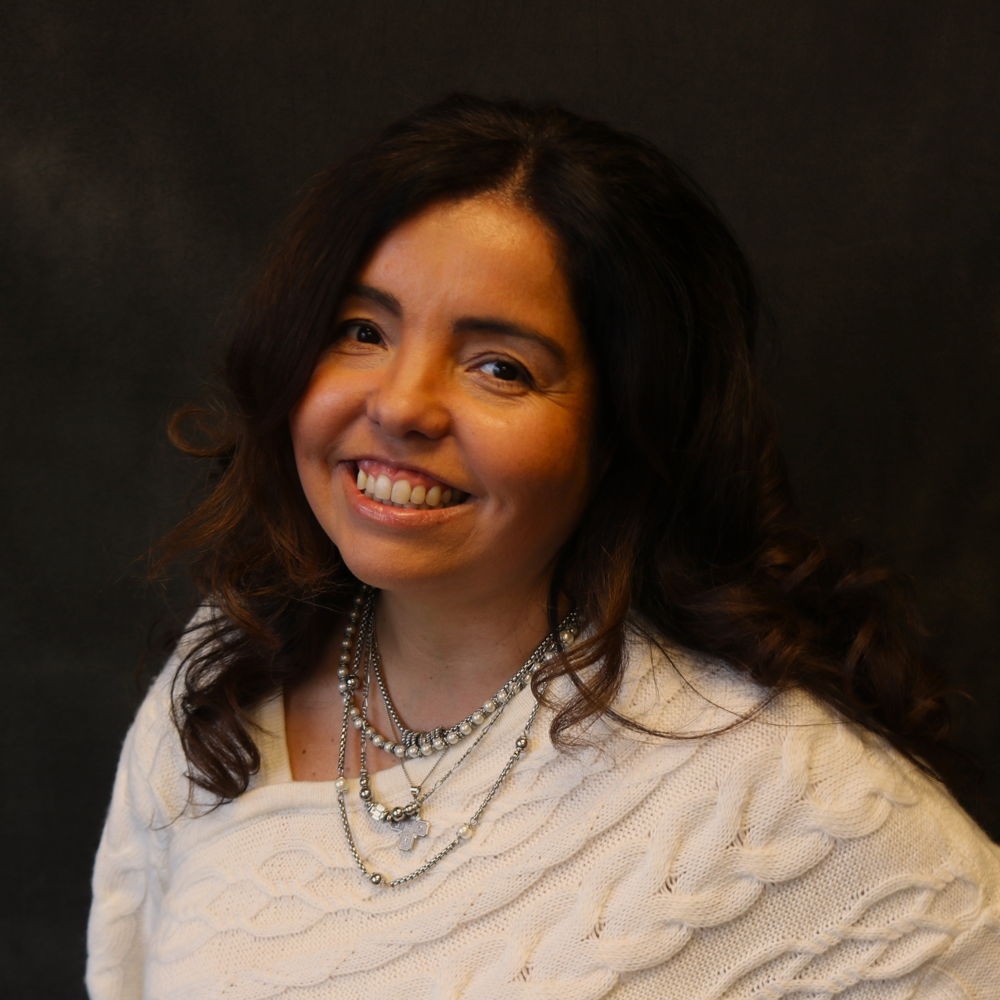 Dr. Annette  Garza D.C.